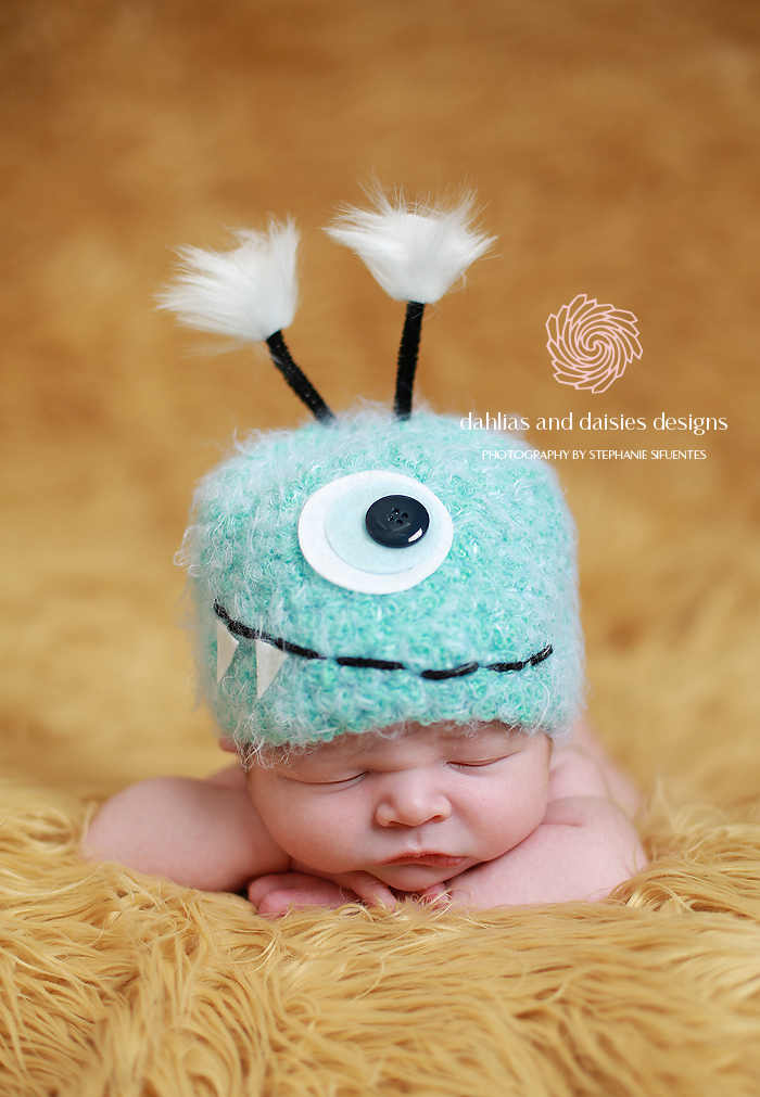 Dallas Newborn in a Monster Hat