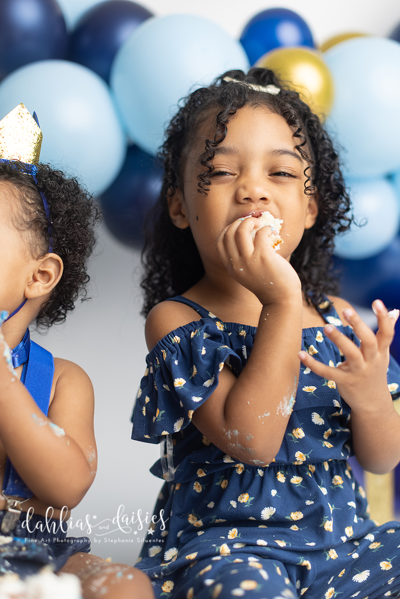 Baby boys sister joins for his cake smash photography session