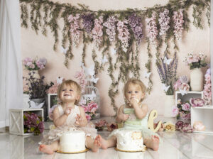 12 month old twins laugh while eating cake