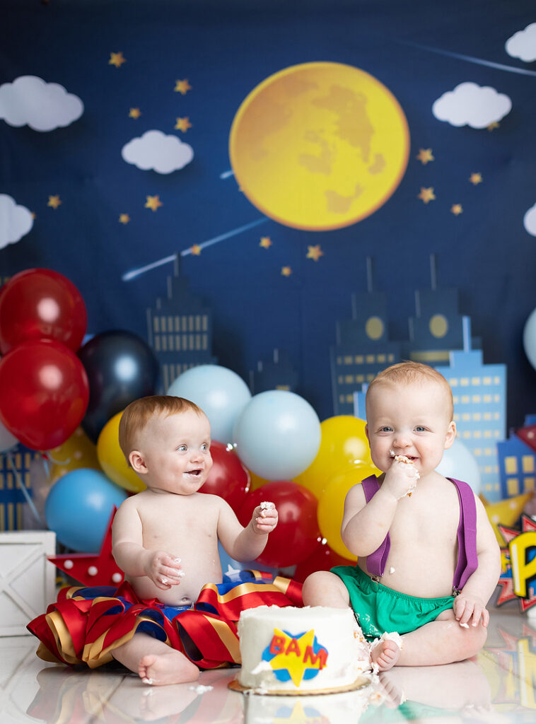 Dallas twins at their super hero themed cake smash photography session