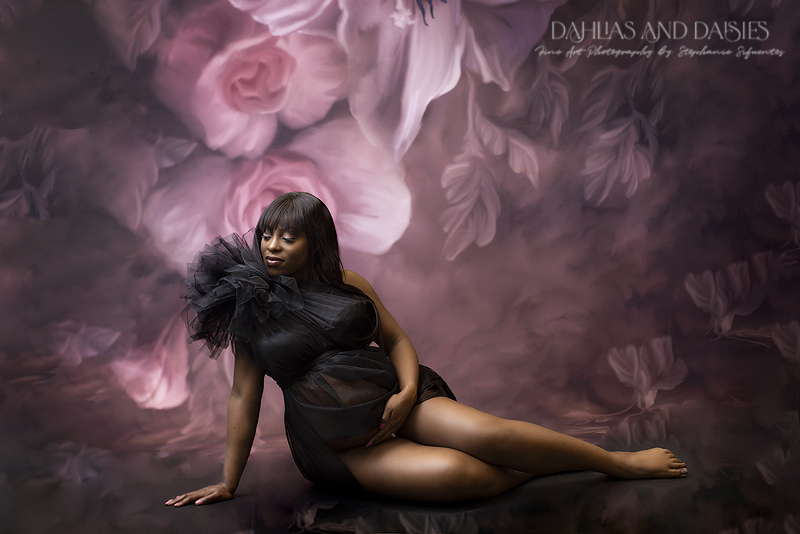 Pregnant woman poses at maternity photography session