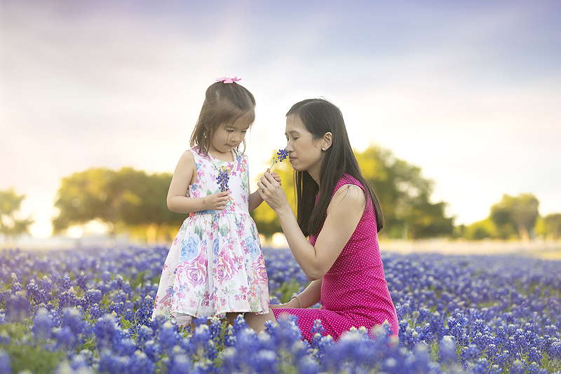 Mother and daughter in bluebonnets