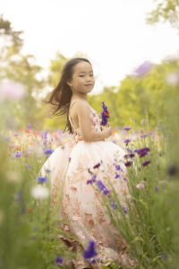 Young girl in wildflower field