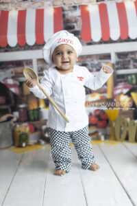 Baby dressed as chef for Dallas cake smash photographer