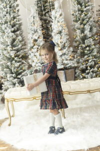 Young girl hold present