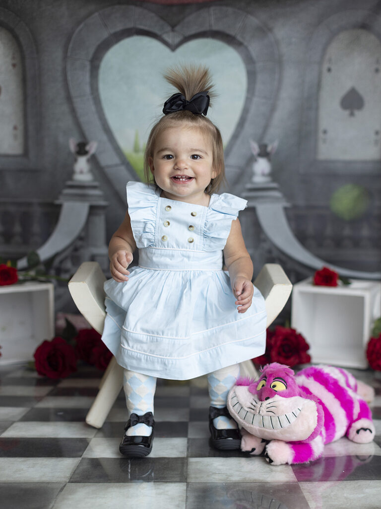11 month old girl dress is Alice in Wonderland