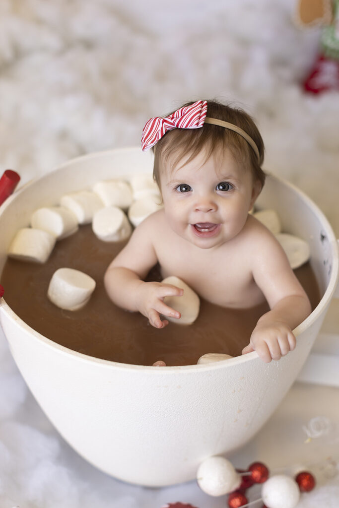 Baby in hot coco cup