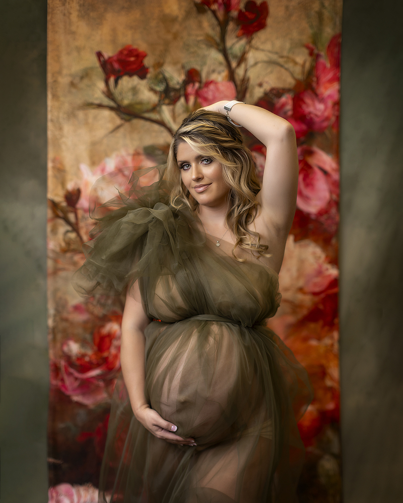 Pregnant woman wearing green tulle