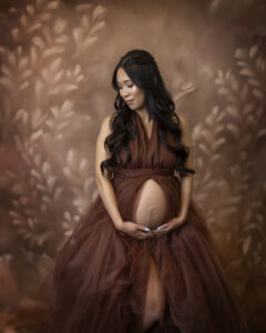 Pregnant woman wears rust colored dress