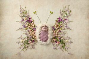 Newborn girl as butterfly