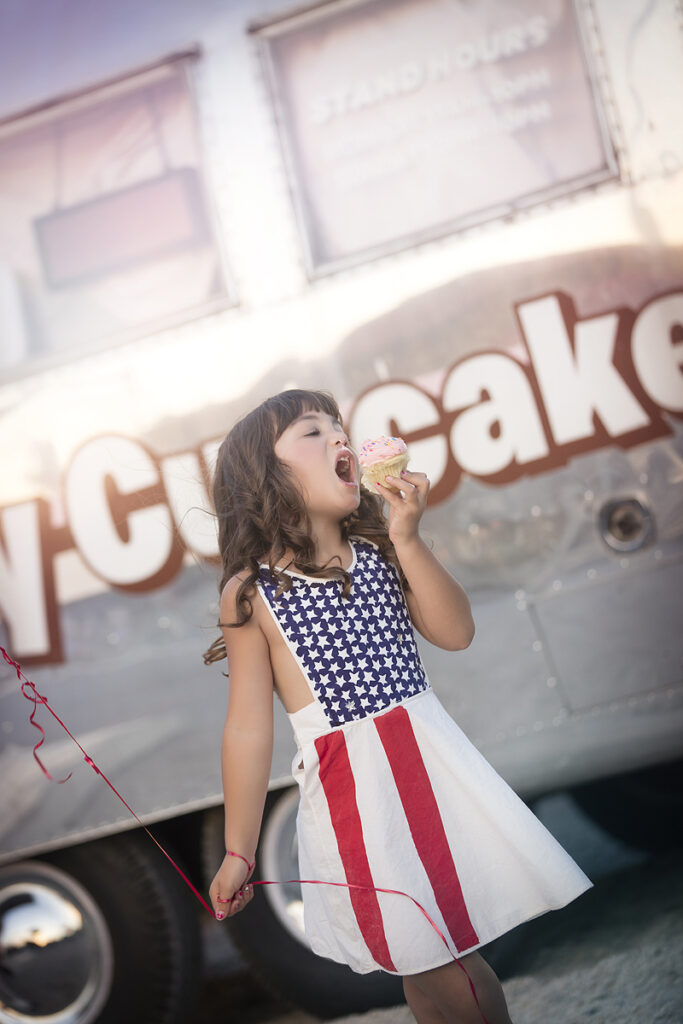 Girls eats cupcake